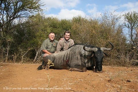 GOOD TEAM: Whitey and I with the bull that both of us had a hand in. Photo by Conor Harrison, LSON. IMG 6464
