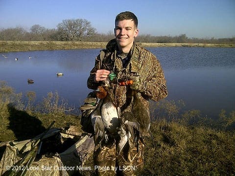 GOOD STRAP: Stewart McSwain holds a nice strap of ducks after a good morning shoot in McLennan County. astewart